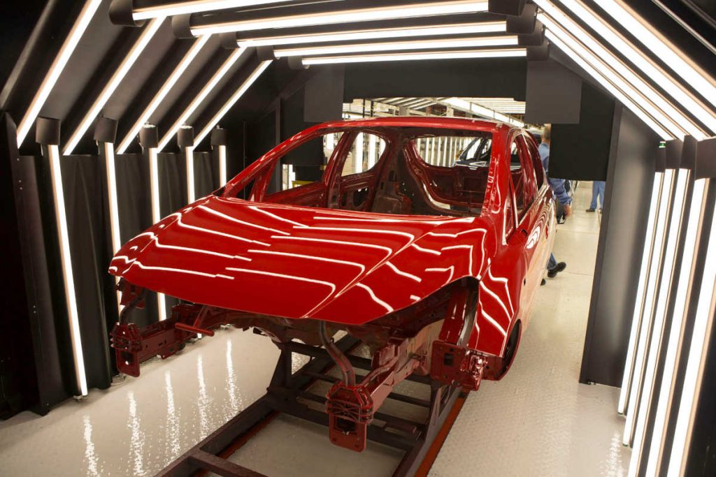 the bodywork of an opel corsa being inspected on the move without the need to alter the production line